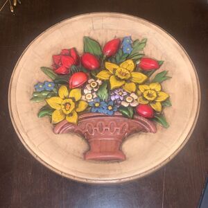 Vintage hand painted flowers in a basket ceramic wall hanging